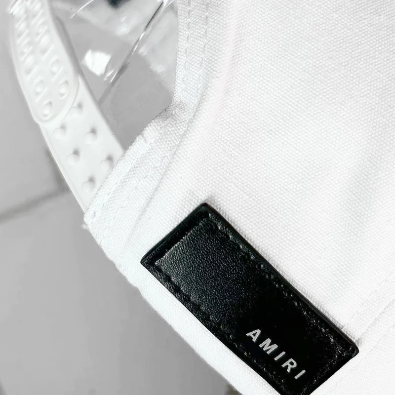 CASA-AMIRI STENCIL TRUCKER HAT
