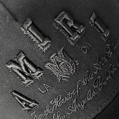 CASA-AMIRI STENCIL TRUCKER HAT