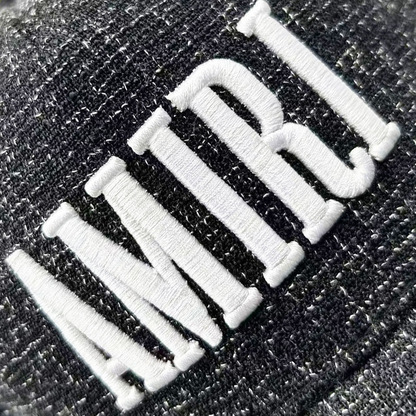 CASA-AMIRI STENCIL TRUCKER HAT