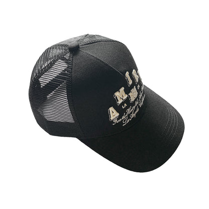 CASA-AMIRI STENCIL TRUCKER HAT